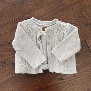 Cable knit cardigan by Tea Collection. Size 9-12 mos